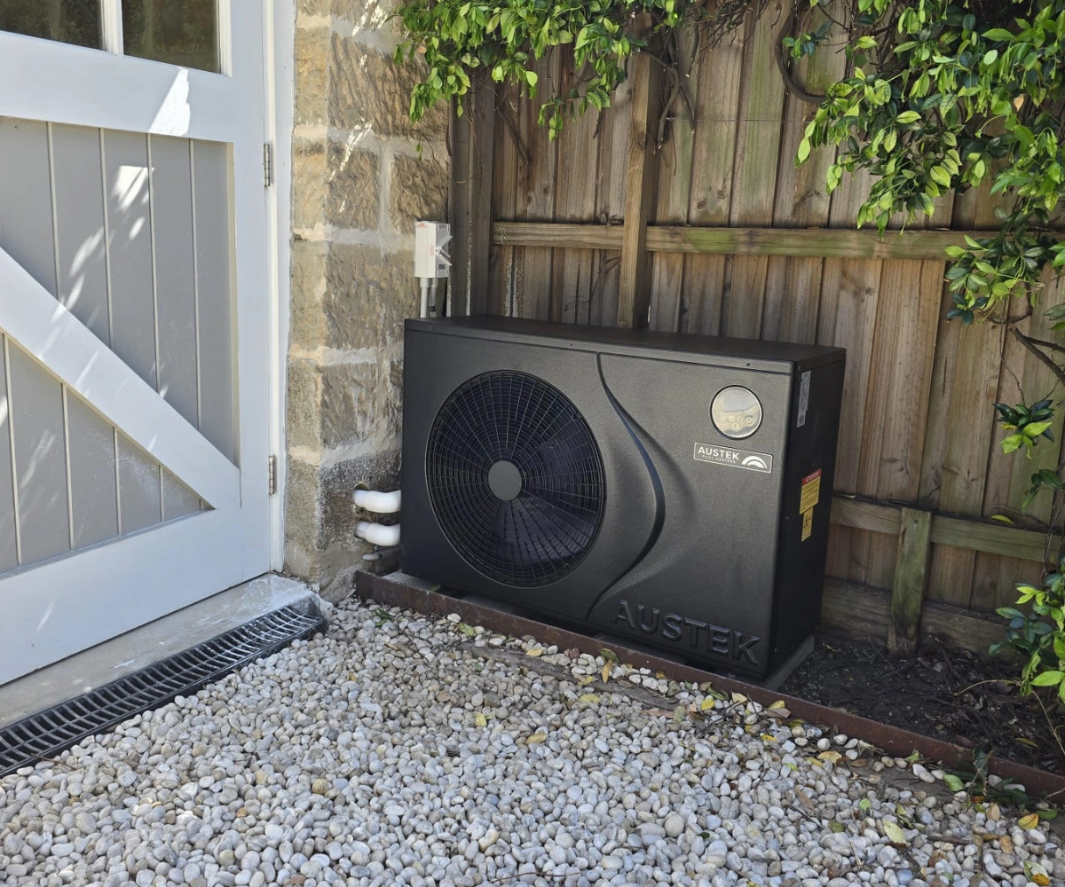 Pool heat pump sandstone core run installation in Haberfield, Sydney